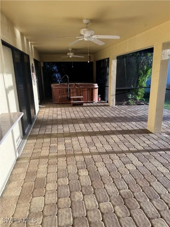 4628 SW 18th Ave, Cape Coral, FL 33914 - view of patio / terrace featuring a hot tub and ceiling fan