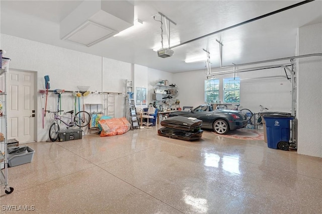 garage featuring a garage door opener
