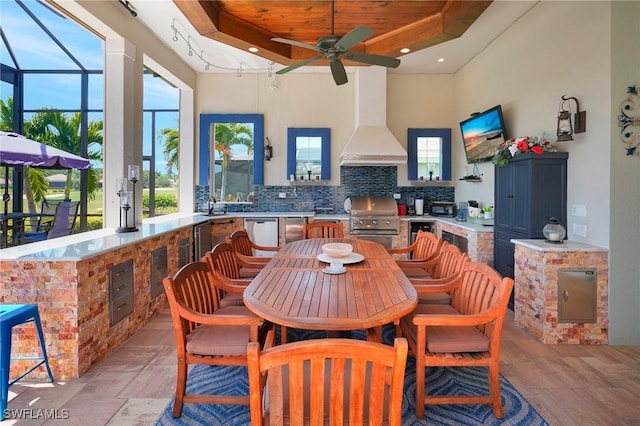 dining room with a ceiling fan, wooden ceiling, a raised ceiling, and recessed lighting