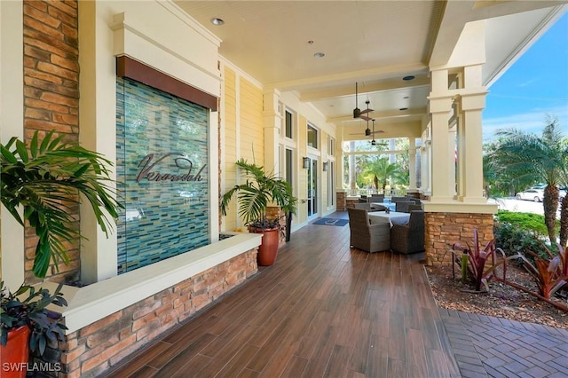 view of patio / terrace with a porch and a ceiling fan
