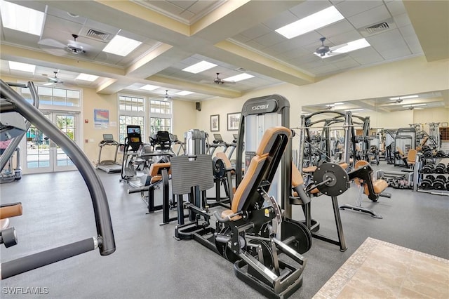gym featuring a ceiling fan and visible vents