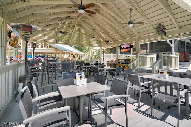 view of patio / terrace with outdoor dining space and ceiling fan