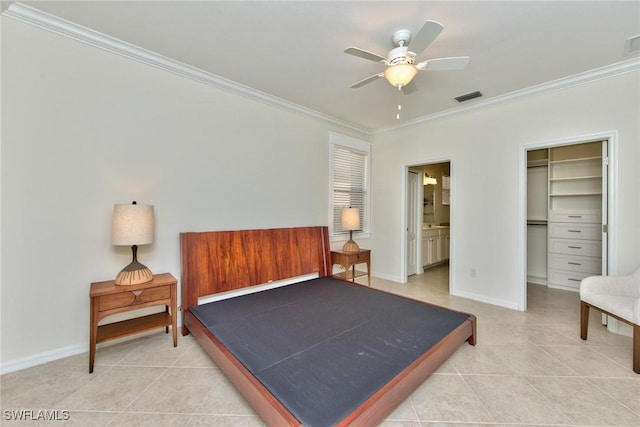 bedroom featuring crown molding, baseboards, visible vents, and light tile patterned floors