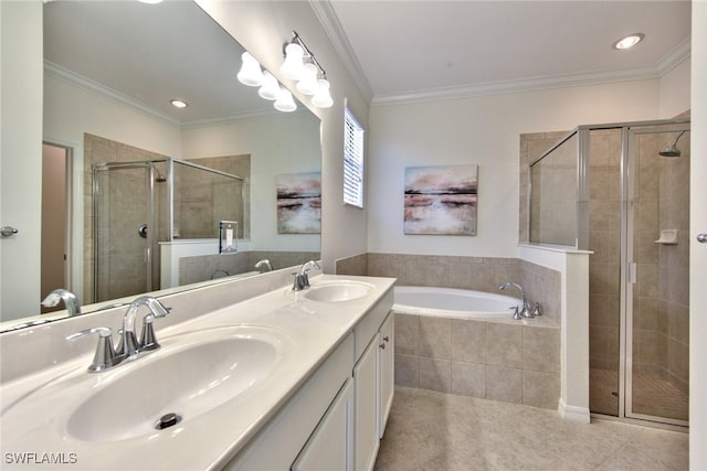 full bathroom with ornamental molding, a sink, a stall shower, and tile patterned flooring