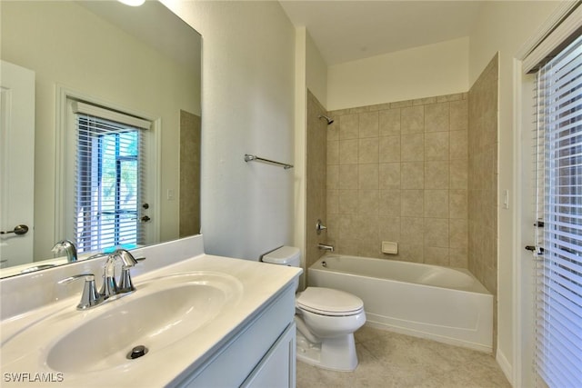 bathroom with  shower combination, toilet, tile patterned floors, and vanity