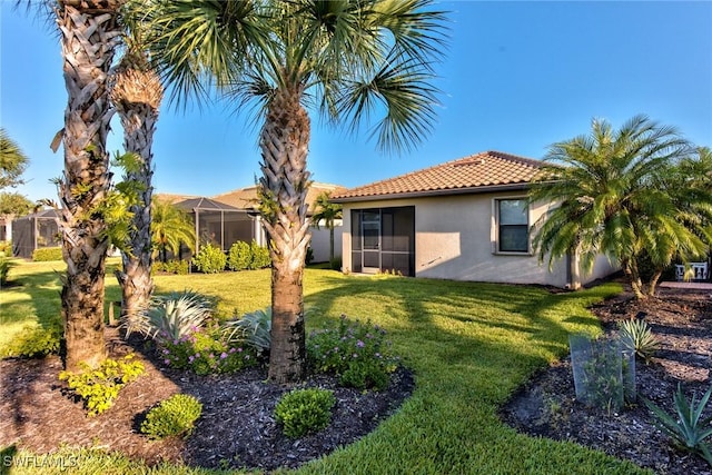 view of yard featuring a lanai
