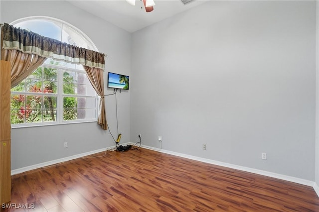 510 13th St NW, Naples, FL 34120 - empty room with baseboards, visible vents, ceiling fan, and wood finished floors
