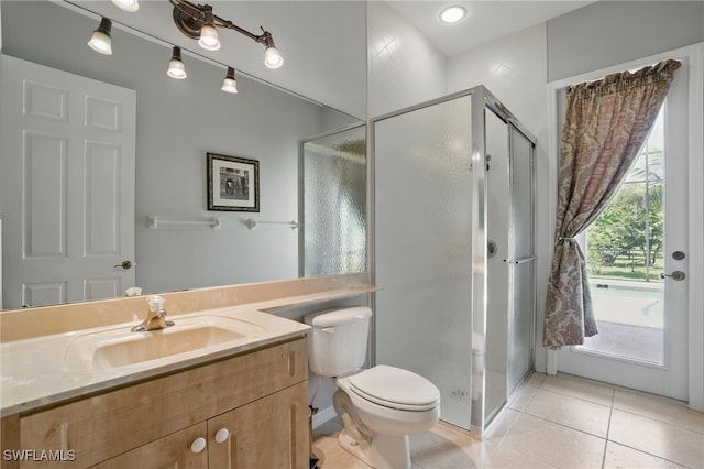 510 13th St NW, Naples, FL 34120 - full bathroom with tile patterned flooring, vanity, toilet, and a stall shower