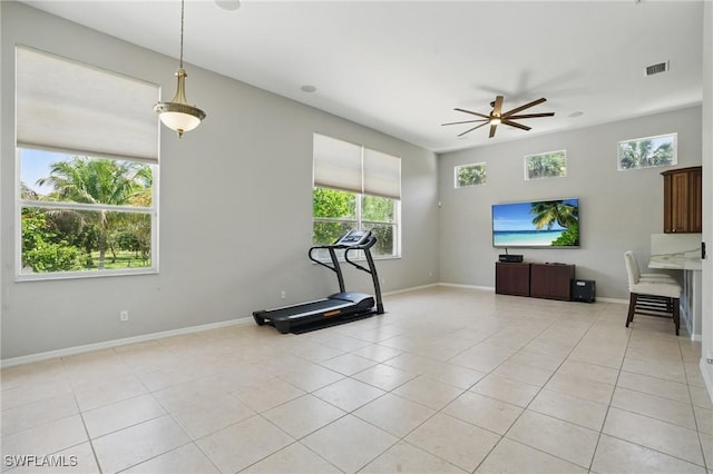 510 13th St NW, Naples, FL 34120 - exercise area with a ceiling fan, light tile patterned floors, baseboards, and visible vents