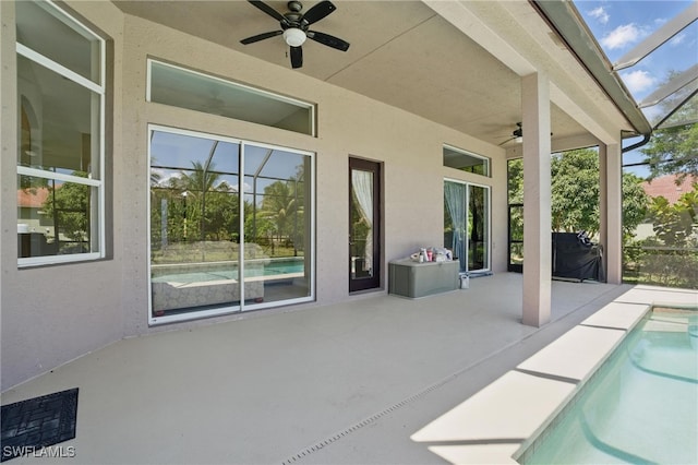 510 13th St NW, Naples, FL 34120 - view of patio / terrace with a ceiling fan, an outdoor pool, and a lanai