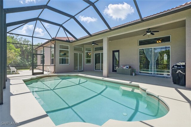 510 13th St NW, Naples, FL 34120 - outdoor pool with ceiling fan, a lanai, and a patio area