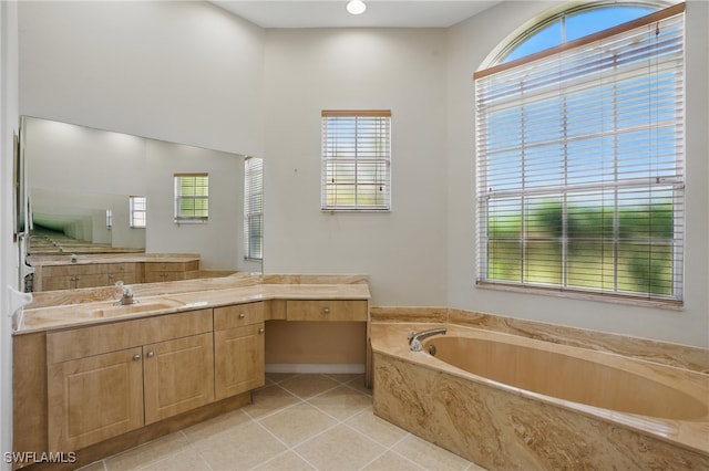 510 13th St NW, Naples, FL 34120 - full bathroom featuring tile patterned flooring, plenty of natural light, vanity, and a bath