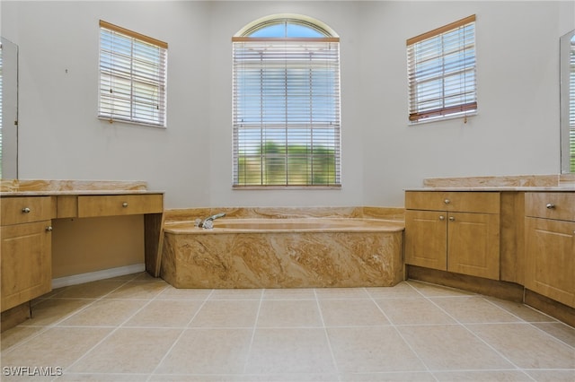 510 13th St NW, Naples, FL 34120 - full bathroom with a garden tub, tile patterned flooring, and vanity