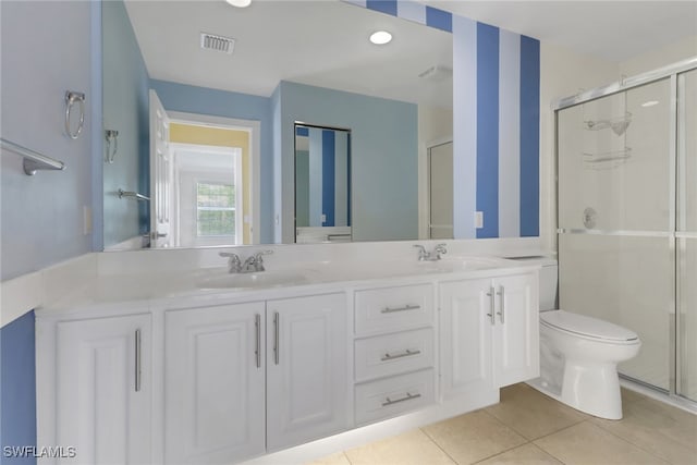 7933 Umberto Ct, Naples, FL 34114 - bathroom with tile patterned flooring, a sink, a shower stall, and visible vents