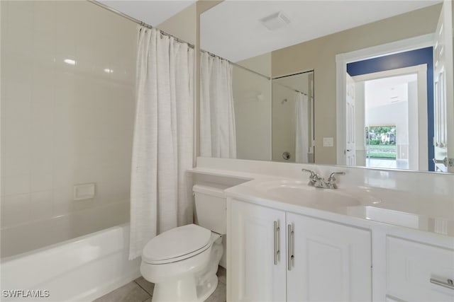 7933 Umberto Ct, Naples, FL 34114 - full bath featuring vanity, shower / tub combo with curtain, toilet, tile patterned floors, and visible vents