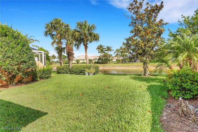 7933 Umberto Ct, Naples, FL 34114 - view of yard with a water view