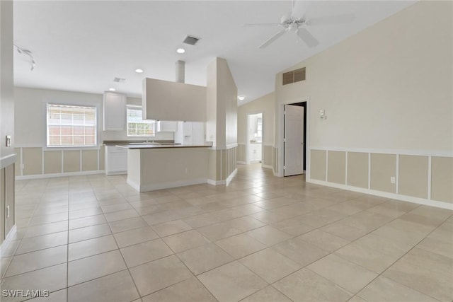 7933 Umberto Ct, Naples, FL 34114 - kitchen with open floor plan, a ceiling fan, light tile patterned flooring, and visible vents