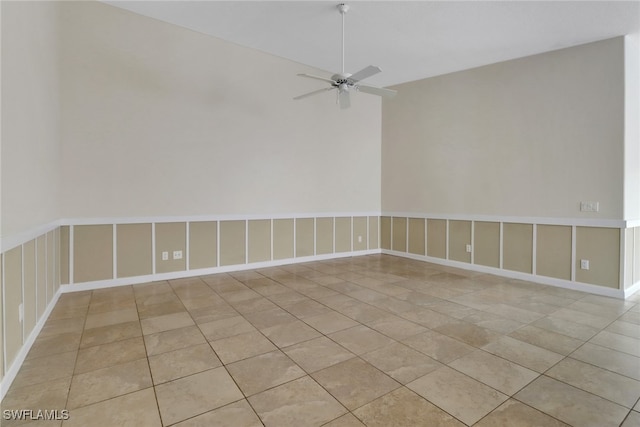 7933 Umberto Ct, Naples, FL 34114 - unfurnished room featuring light tile patterned flooring and a ceiling fan