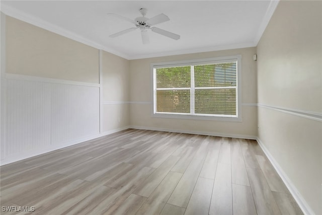 7933 Umberto Ct, Naples, FL 34114 - empty room with ornamental molding, wood finished floors, ceiling fan, and wainscoting