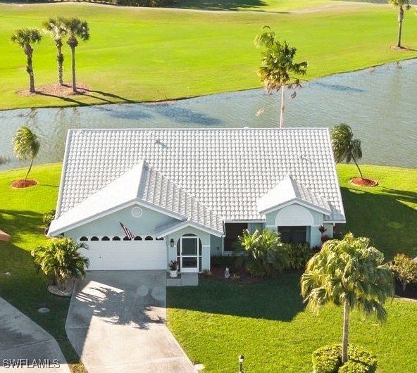 bird's eye view with a water view