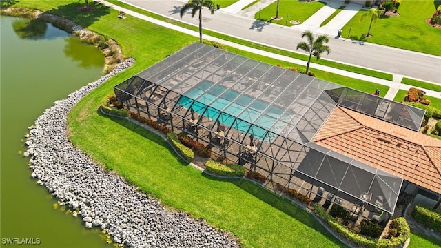 bird's eye view with a water view