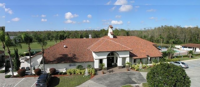 view of front facade featuring a tiled roof