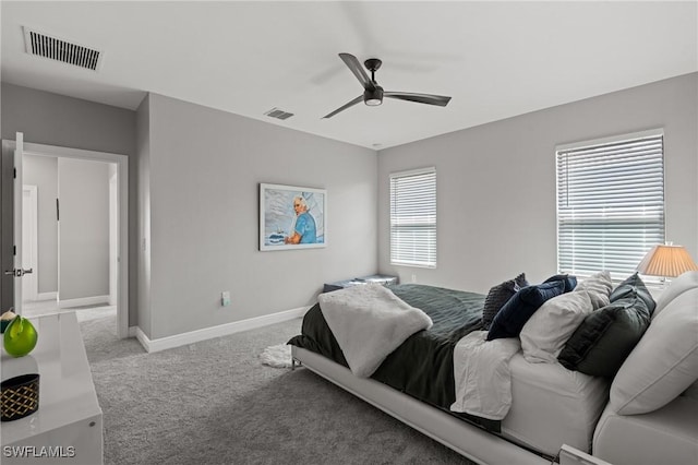1338 Kendari Ter, Naples, FL 34113 - bedroom featuring ceiling fan, carpet flooring, baseboards, and visible vents