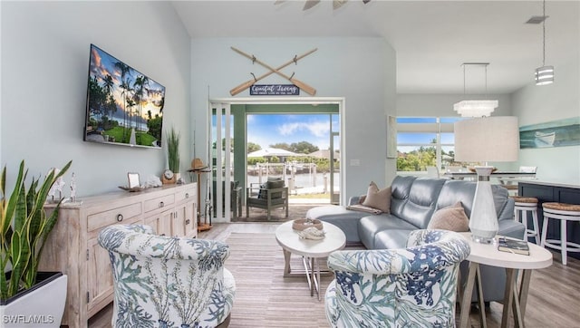 162 Windward Cay, Naples, FL 34114 - living area featuring light wood-style flooring and visible vents