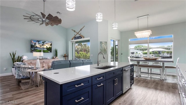 162 Windward Cay, Naples, FL 34114 - kitchen featuring light countertops, a sink, dark wood finished floors, and a ceiling fan