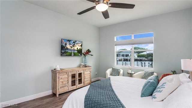 162 Windward Cay, Naples, FL 34114 - bedroom with baseboards, a ceiling fan, and dark wood finished floors