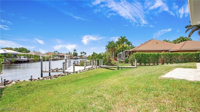 162 Windward Cay, Naples, FL 34114 - view of yard with a water view, a boat dock, and boat lift