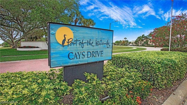 162 Windward Cay, Naples, FL 34114 - community / neighborhood sign with a yard