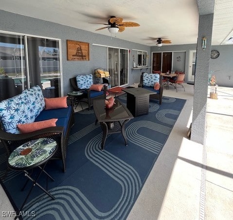 408 SE 19th Ln, Cape Coral, FL 33990 - view of patio / terrace featuring an outdoor living space, ceiling fan, and outdoor dining area