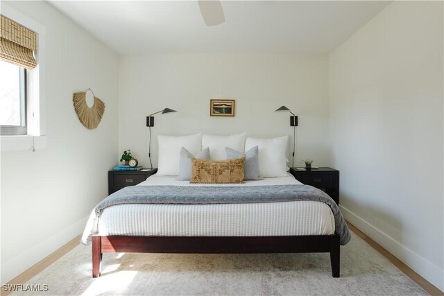 167 1st St, Bonita Springs, FL 34134 - bedroom featuring baseboards and ceiling fan