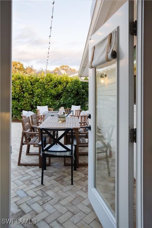 167 1st St, Bonita Springs, FL 34134 - view of patio with outdoor dining space