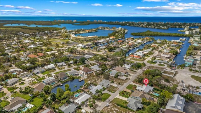 167 1st St, Bonita Springs, FL 34134 - drone / aerial view featuring a residential view and a water view