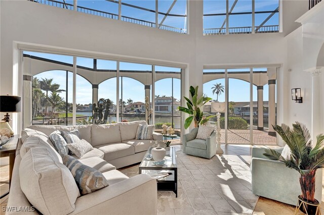 159 Geranium Ct, Marco Island, FL 34145 - living area featuring a towering ceiling and a water view