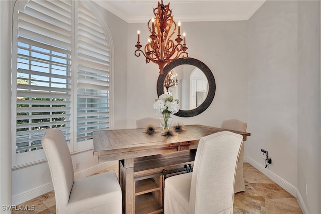 159 Geranium Ct, Marco Island, FL 34145 - dining area with a chandelier, stone tile flooring, crown molding, and arched walkways