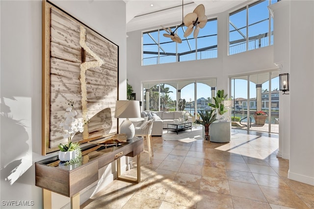 159 Geranium Ct, Marco Island, FL 34145 - living room with baseboards and a high ceiling