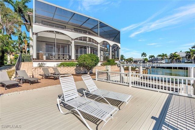 159 Geranium Ct, Marco Island, FL 34145 - wooden terrace featuring a lanai, a water view, a boat dock, and boat lift