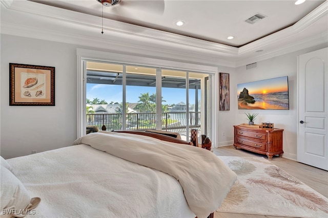 159 Geranium Ct, Marco Island, FL 34145 - bedroom featuring a tray ceiling, crown molding, access to outside, light wood-style floors, and recessed lighting