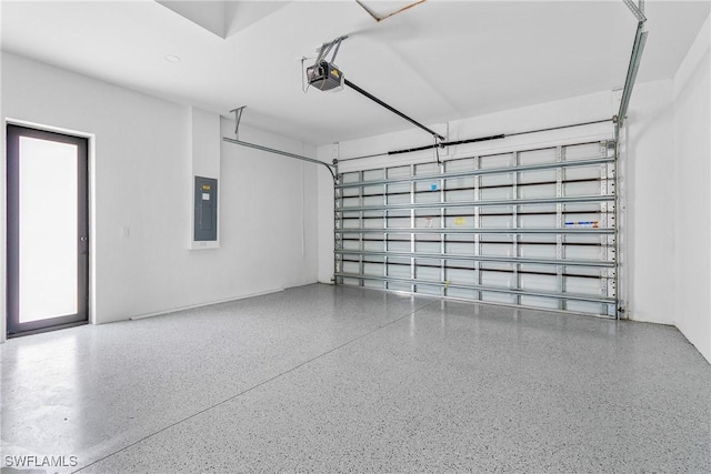 garage featuring a garage door opener and electric panel