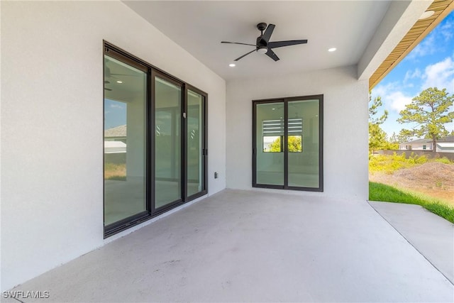view of patio with ceiling fan