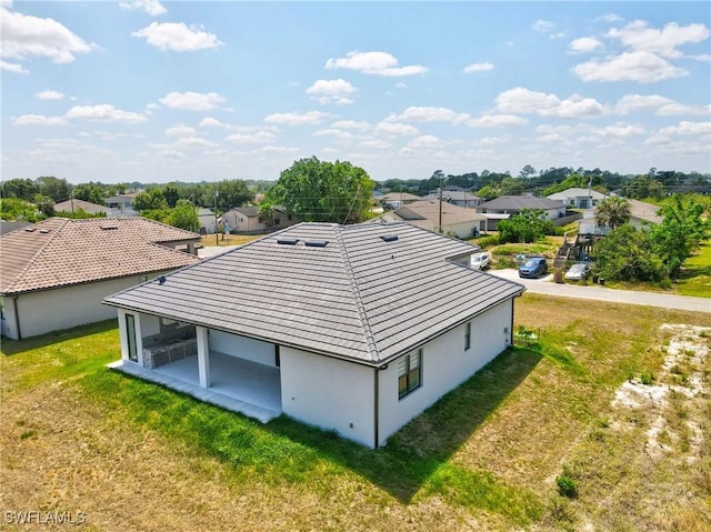 drone / aerial view with a residential view