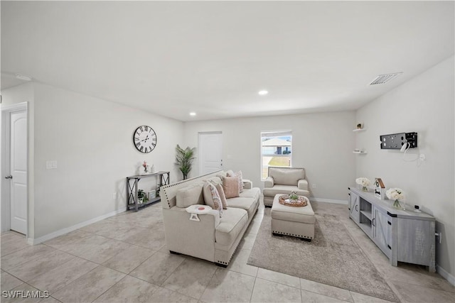 living room with baseboards, visible vents, recessed lighting, and light tile patterned floors