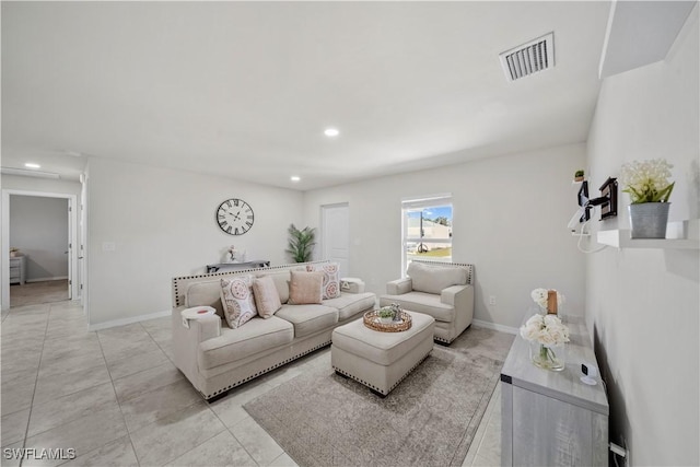 living area with baseboards, visible vents, recessed lighting, and light tile patterned floors