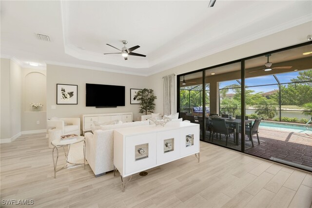 28091 Foxrock Ct, Bonita Springs, FL 34135 - living area with a ceiling fan, visible vents, and plenty of natural light