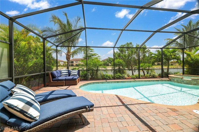 28091 Foxrock Ct, Bonita Springs, FL 34135 - view of swimming pool featuring a lanai, a patio area, and a pool with connected hot tub