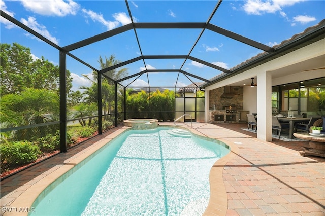 28091 Foxrock Ct, Bonita Springs, FL 34135 - view of pool with area for grilling, a pool with connected hot tub, a patio area, a lanai, and outdoor dining space