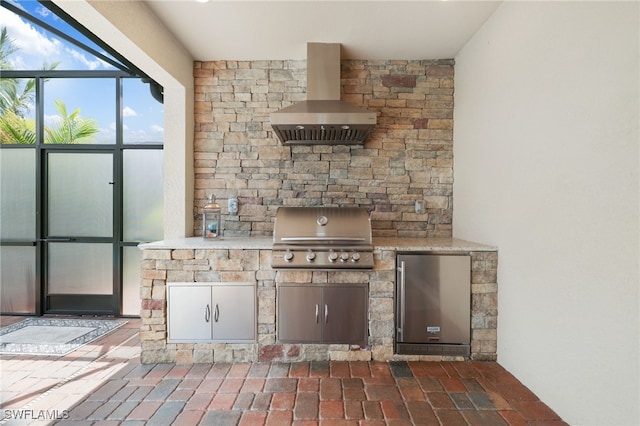 28091 Foxrock Ct, Bonita Springs, FL 34135 - view of patio with area for grilling, glass enclosure, and exterior kitchen